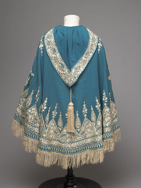 Twilled peacock blue woollen cloth embroidered in cream silk thread 