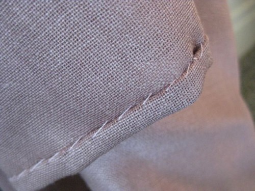 Whipstitched rolled hem
