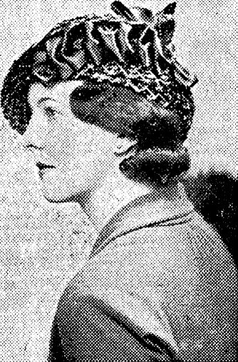 Loops of silk adorn this charming spring model in cellophane and ramie. New Zealand Herald, 16 April 1932