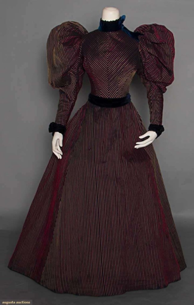 1890s day dress of black cotton with raised red & yellow stripes, with black velvet trim.  Sold by Augusta Auctions, Nov 12 2014