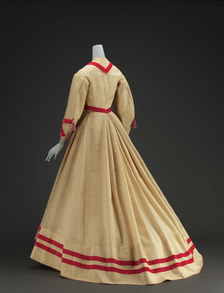 Dress, American, About 1868, USA, Alpaca with silk velvet ribbon and covered buttons, silk tassels, cotton linen inner bodice, glazed cotton lining, and metal closure, MFA Boston, 52.1653