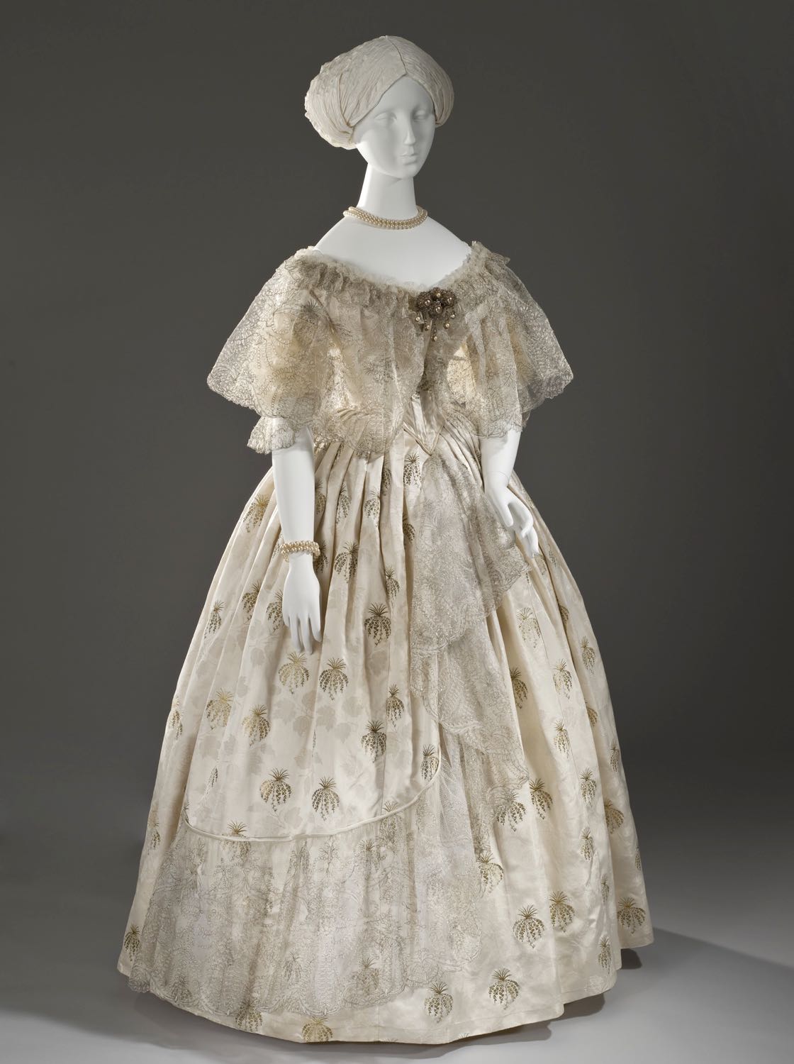 Evening dress, ca. 1850, Silk satin with silk and metallic-thread supplementary patterning and silk net with metallic-thread embroidery, M.2007.211.872a-b