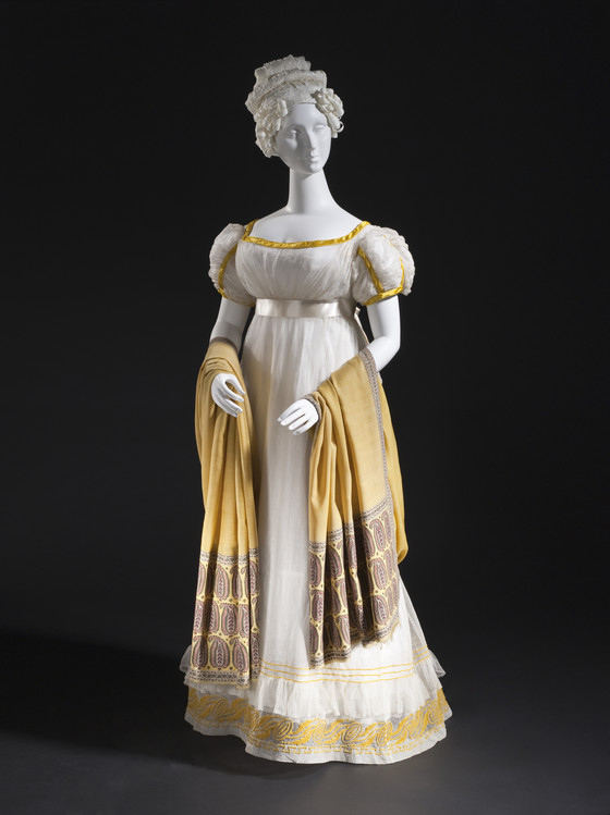 Woman’s Dress, France, circa 1820, Cotton gauze and cotton bobbin net with wool embroidery and silk satin trim, LACMA, M.2007.211.18