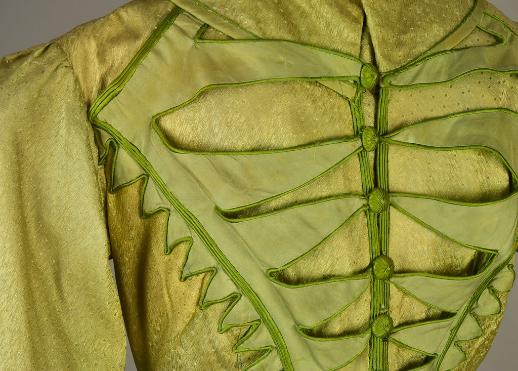 Pelisse, figured silk with velvet trim, 1815-20, Helen Larson Historic Costume Collection sold by Whitaker Auctions