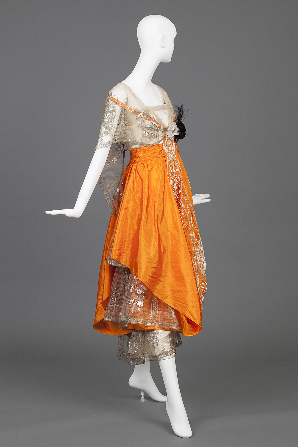 Evening Gown Of Cream Silk Satin and Orange Silk Taffeta, Hollander, L.P., 1916-1917, USA, silk, pearl beads, chenille yarn, aigrette feathers, Goldstein Museum of Design 1982.016.015