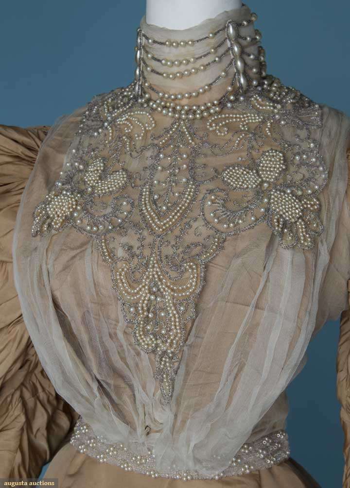 Reception gown, 1895-1896, labelled 'Sprague Battle Creek', silk faille with silk chiffon, net, and beading, sold by August Auctions, Lot 400 November 14, 2012 NYC