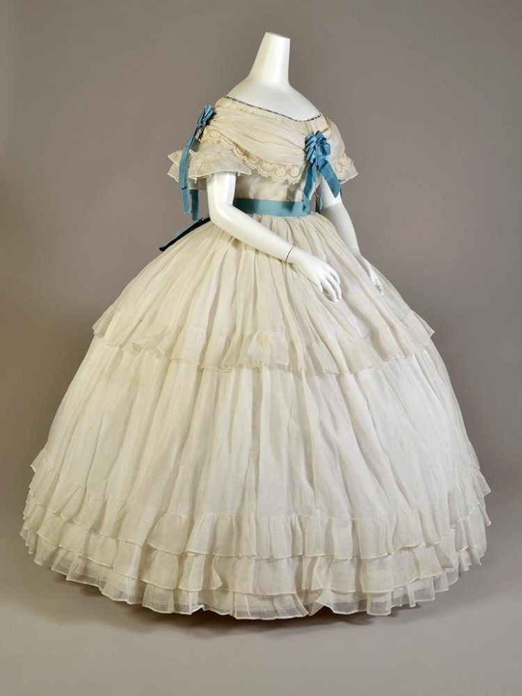 white dresses with blue satin sashes