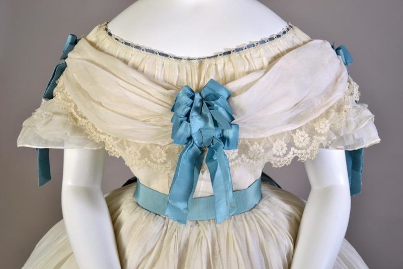 Dress, cotton with blue silk sash and bow, French, ca. 1860, KSUM 1983.1.2071 a-h.