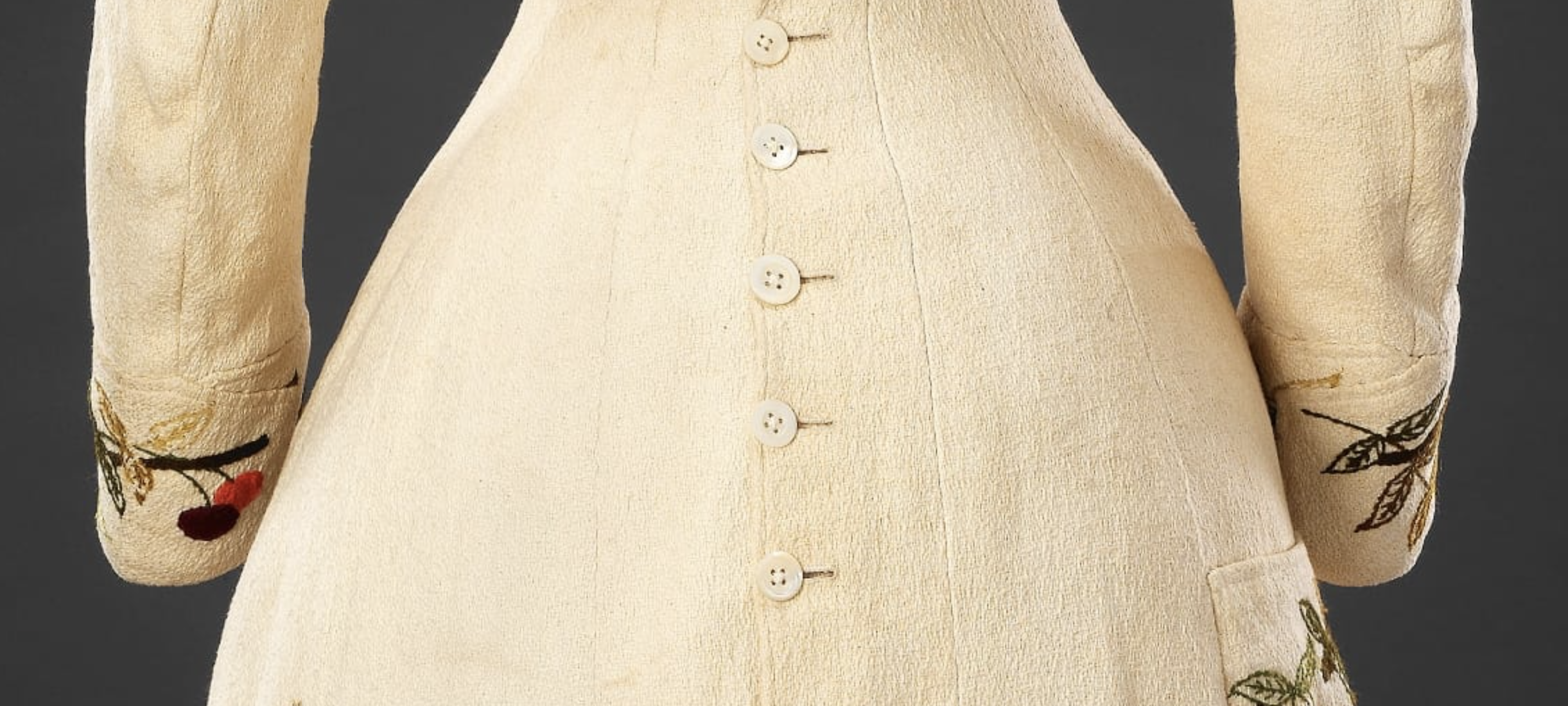 Dress, Circa 1880, Cotton embroidered with wool; mother of pearl buttons, John Bright Collection