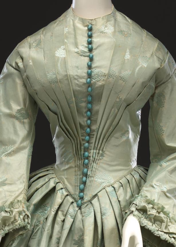 Wedding dress, 1850, England, silk, cotton, 145.0 cm (centre back) 51.0 cm (sleeve length) National Gallery of Victoria, Melbourne Gift of Mrs Betty Blunden, 1979, D5-1979