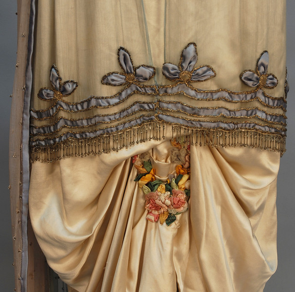 Evening gown, silk satin and silk net, with appliques and beading, Lucile, Lady Duff Gordon, ca. 1914, sold by Augusta Auctions