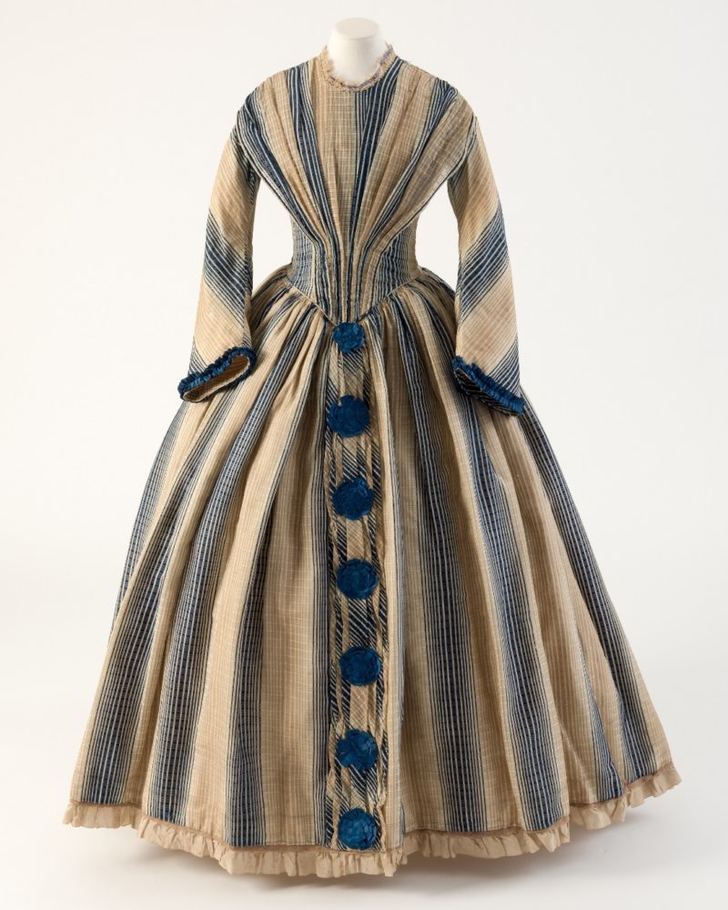 Day dress of wool gauze with silk pom poms, 1840s, Fashion Museum Bath