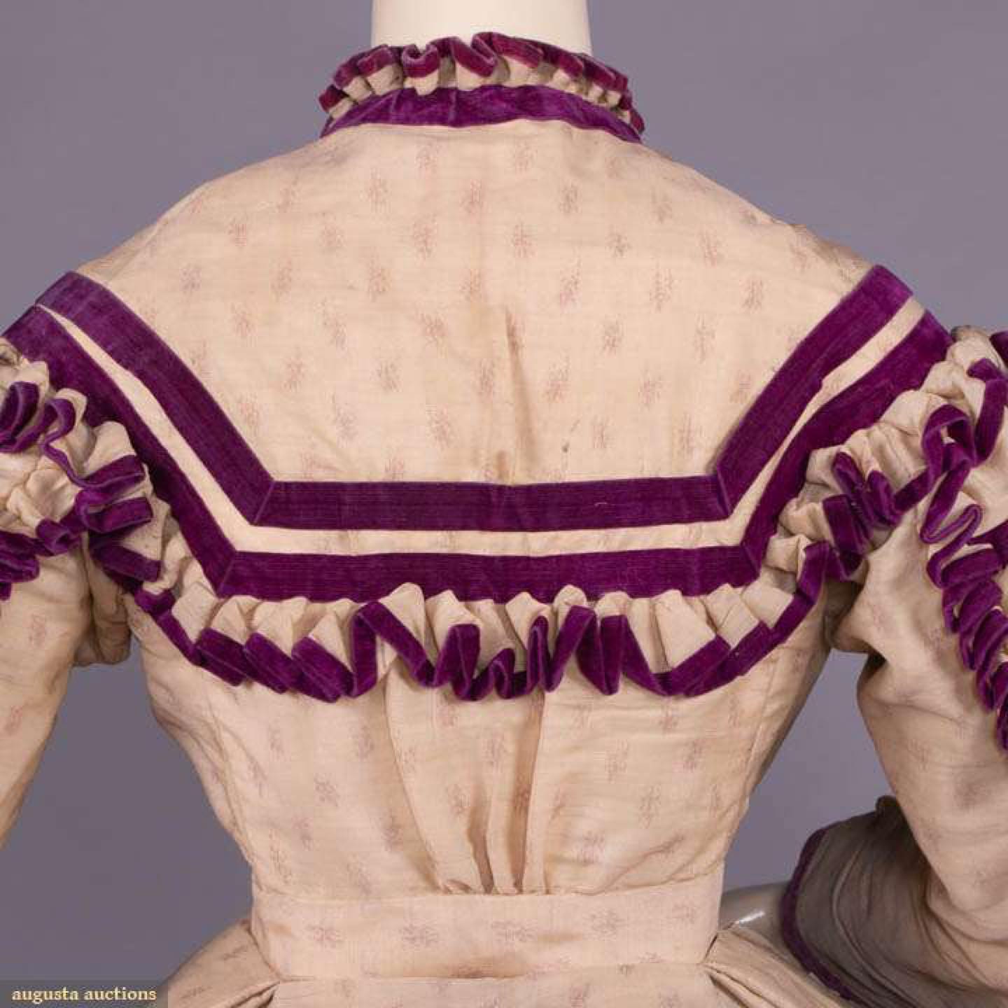 Day dress of figured barège trimmed in purple silk velvet ribbon, 1866-1867, sold by Augusta Auctions, Feb 2021