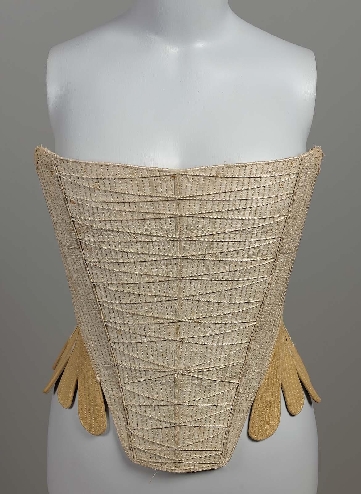 Stays, 1740–60, Massachusettes or New York, USA, White moiré silk rep front, beige linen back; ecru linen lining. White silk ribbon over seams, MFA Boston, 44.347