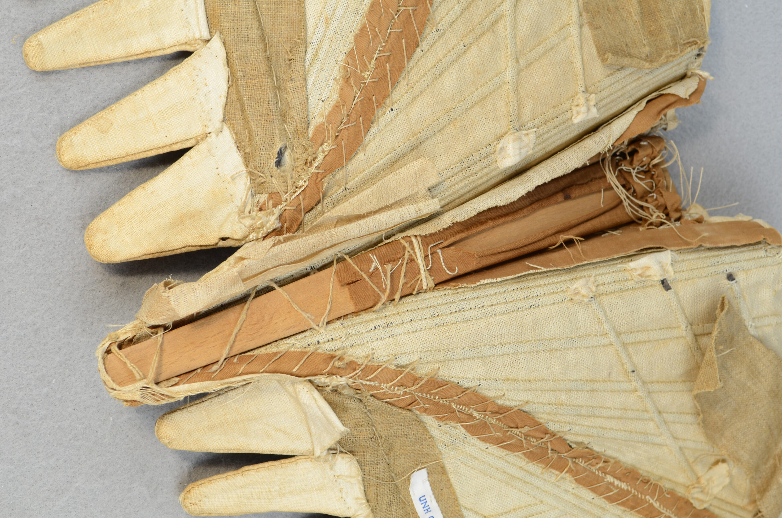 1780-1790. Brown twill linen half-boned stays w shoulder straps & 18 waist tabs, interlined with plain-weave linen, stiffened with whalebone, linen canvas, & wooden busk, University of New Hampshire Library 475