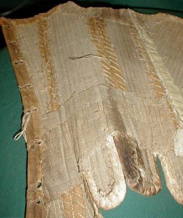 Stays, 1740-1760, America, Two tone tan linen, cane boning (probably). Band of thin cotton down front. Edges & flaps lined w kid leather. Lined w heavy tan homespun linen, sold on Ebay, c.2004 