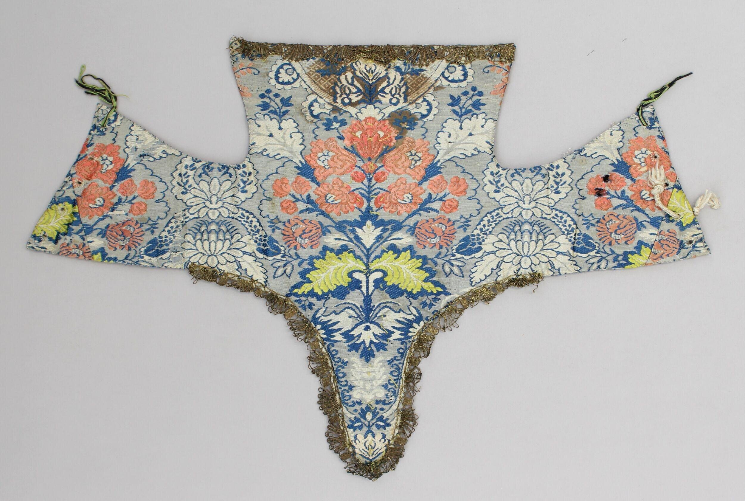 Stomacher (probably from an image robe) 1690-1710, French ? silk woven with a floral pattern, Victoria and Albert Museum