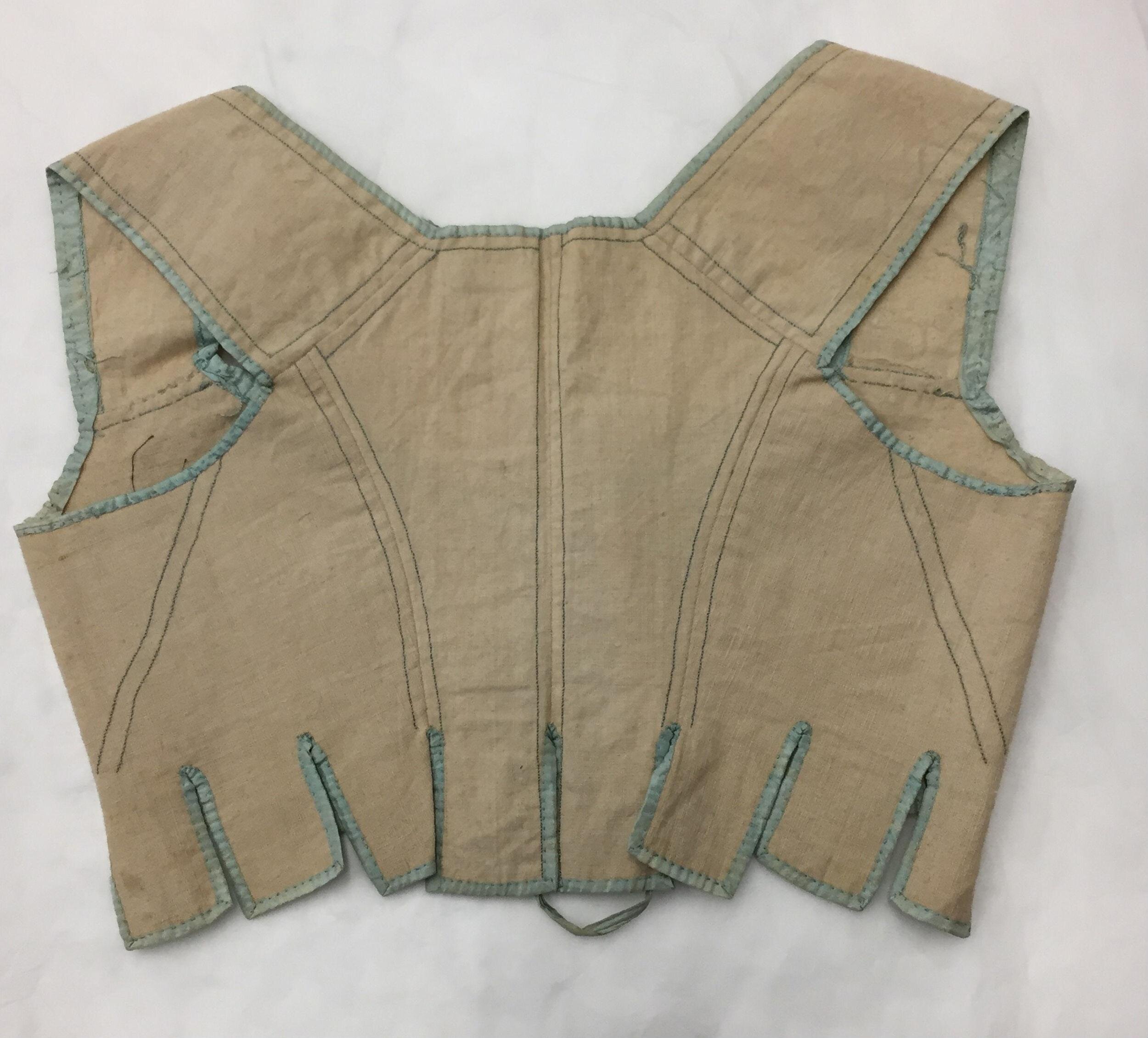 Stays or corset bodice made of linen trimmed with silk ribbon, England, ca. 1800-1815, Victoria and Albert Museum, T.142-1969