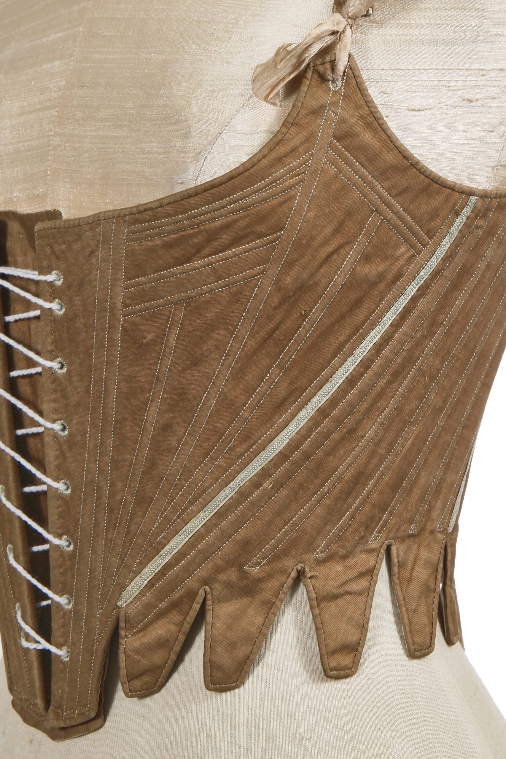 A pair of brown cotton jean stays, circa 1790, sold by Kerry Taylor Auctions in June 2025