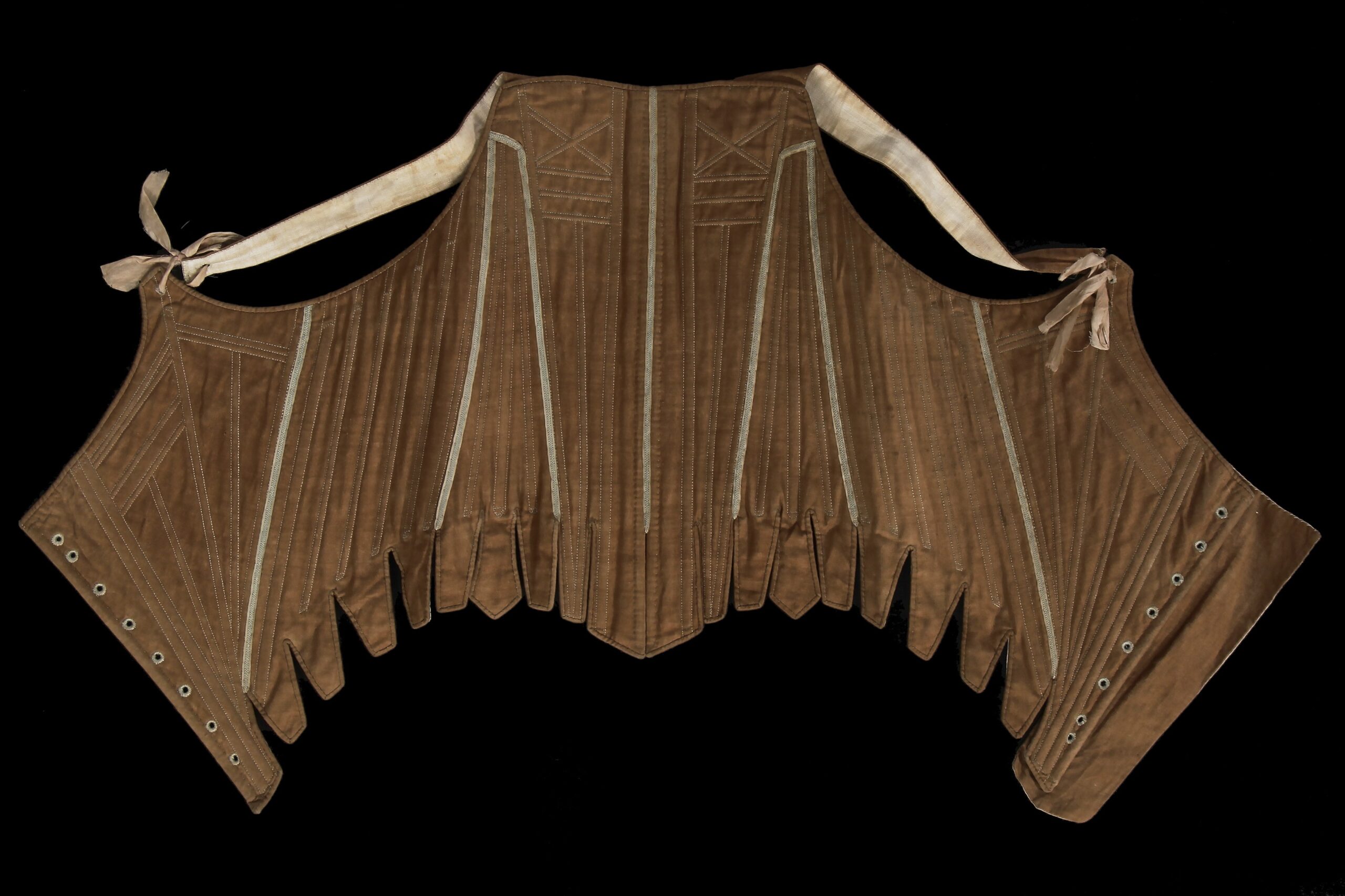 A pair of brown cotton jean stays, circa 1790, sold by Kerry Taylor Auctions in June 2025