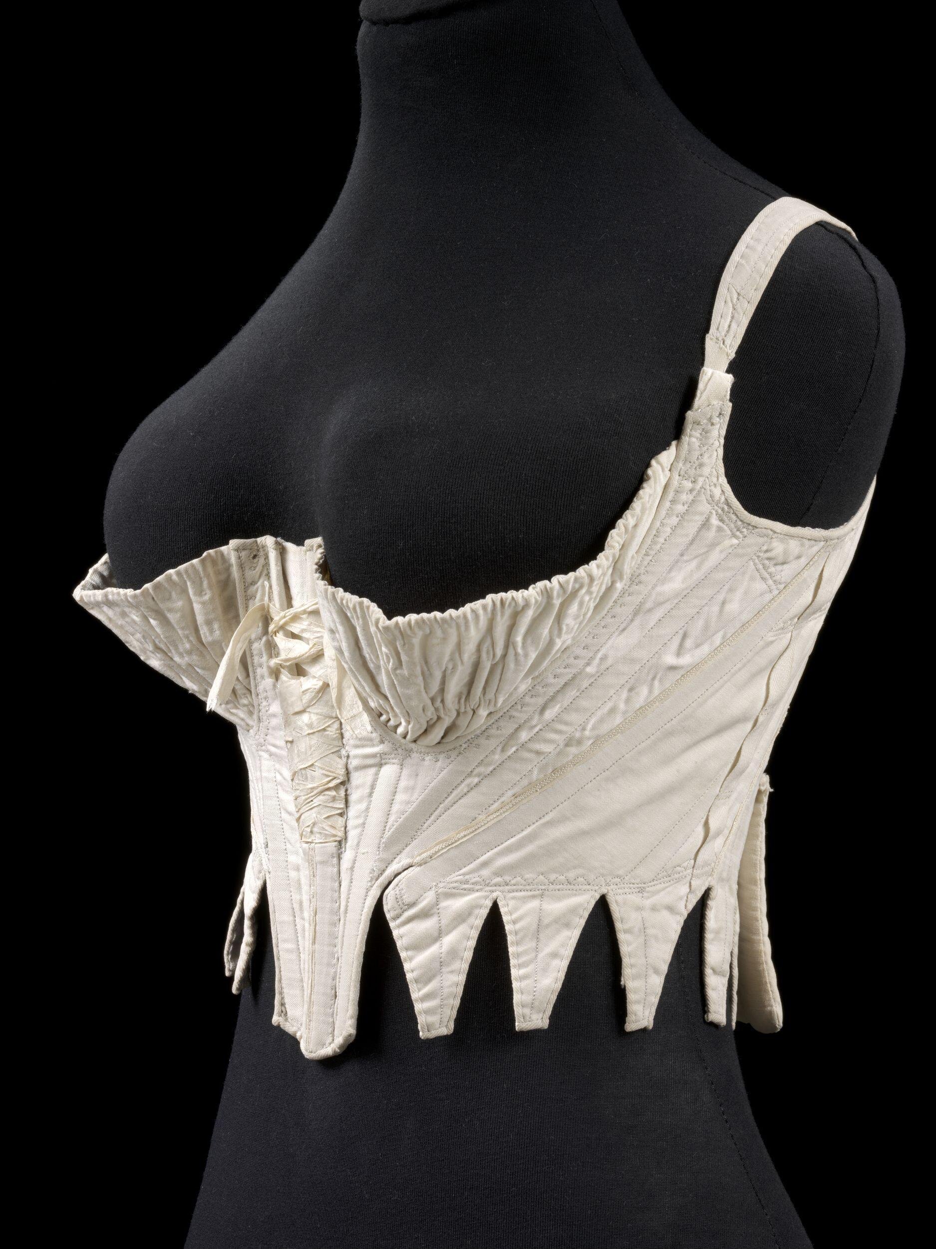 Woman's stays of cotton, 1795-1800, Britiish; gathered cups, back laced, partially boned T.237-1983 V&A